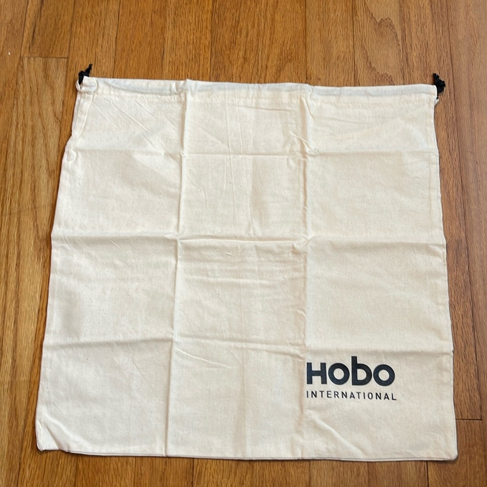 HOBO International dust bag. 16.5”x16.5”. Cream with black accents